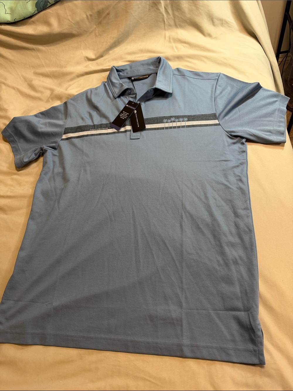 TravisMathew Men's Light Blue Polo with Chest Stripe